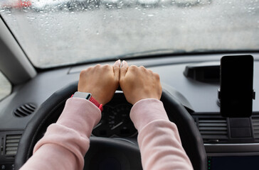 Modern woman driver and searching road by gps map