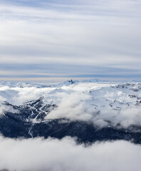 Beautiful Aerial View of Whistler Mountain during a sunny winter day. Taken from Blackcomb Peak, Whistler, British Columbia, Canada. Canadian Nature Landscape