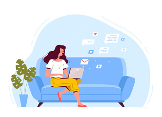 A young woman is sitting on the couch, holding a laptop and texting by email. The concept of remote work