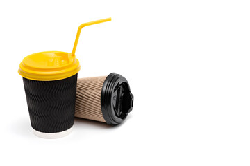 two cardboard cups with lids for coffee on a white background