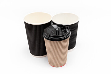 three cardboard cups for coffee on a white background