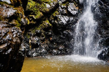  Landscape of a small waterfall inside a cave © Roger