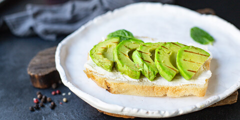 avocado fried sandwich salad vegetable grilled lettuce spinach arugula snack barbecue on the table healthy meal top view copy space text food background rustic image 