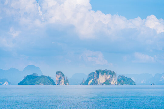 Panoramic view of lsland with cloudy sky / background / seascape
