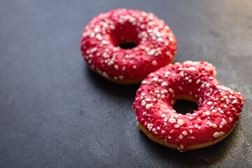 donut sweet dessert raspberries or strawberry berry filling pink icing portion on the table for healthy meal snack top view copy space for text food background rustic
