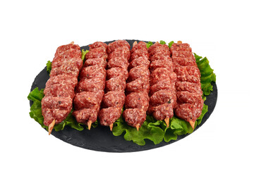 Raw marinated minced meat isolated on white