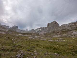 The upper start section of hiking track PR-PNP 24 to the magnificient summits of Mounts Pena Remona, Torre de Salinas, La Padierna and Pico de San Carlos at Picos de Europa National Park, Spain.