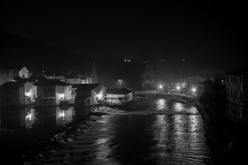 Fototapeta na wymiar Panoramic night view of Borghetto sul Mincio, Verona. Black and white photos. One of the most beautiful villages in Italy.