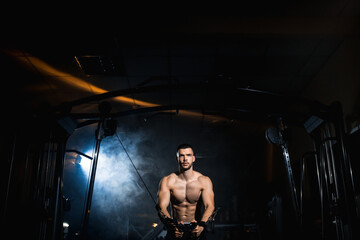 Muscular Fitness Bodybuilder Doing Heavy Weight Exercise In The Gym. Athlete doing pectoral muscle...