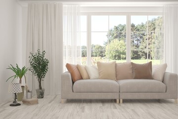 Minimalist living room in white color with sofa and summer landscape in window. Scandinavian interior design. 3D illustration