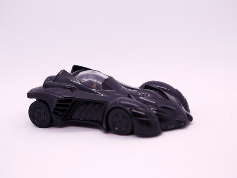 Batmobile. Batman. Bat Super Hero. Car. The Knight Of The Night. Toy Figure. Toy. Classic Super Hero Who Flies. Marvel. DC Comics. Isolated White. 