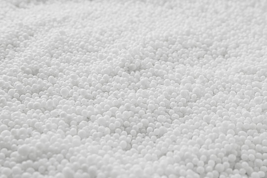 Pellets of ammonium nitrate as background, closeup. Mineral fertilizer