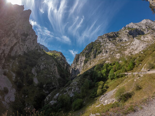 The Cares Route in the heart of Picos de Europa National Park, Cain-Poncebos, Asturias, Spain. Narrow and impressive canyon between cliffs, bridges, caves, footpaths and rocky mountains.