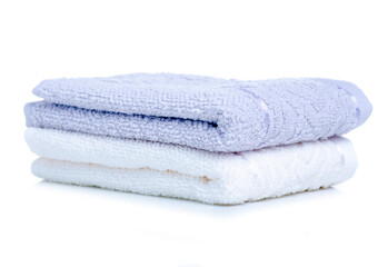 Fototapeta na wymiar White and gray towels on white background isolation