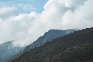 Landscape mountains in line  with clouds and fog