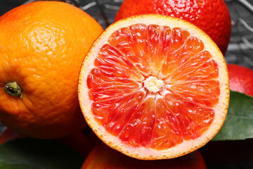 Closeup view of fresh ripe red oranges on table