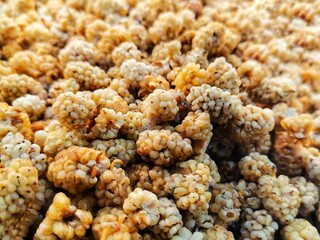 Close-up dry mulberry fruit. Background dry berry and detail shots.