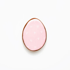 Easter symbol pink gingerbread egg isolated on white. Top view.