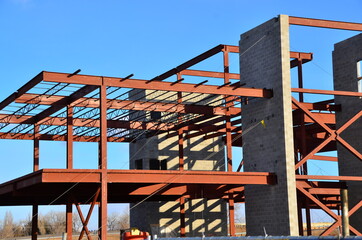 Concrete and steel frame commercial building under construction.