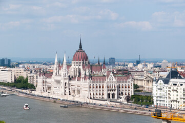 Obraz premium Hungarian Parliament at daytime. Budapest. View from the Danube River. Hungary