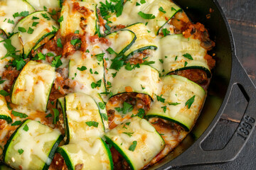 Mushroom Zucchini Lasagna Rolls in a Cast Iron Skillet: Zucchini filled with a mixture of Italian cheeses, mushrooms, and tomato sauce