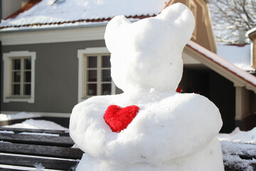 Bear made of snow in the city