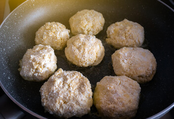 Homemade cheesecakes fried on the pan.