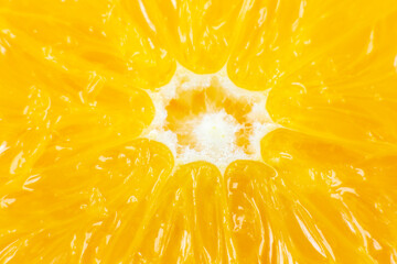 Fototapeta na wymiar Orange fruit texture background. Citrus close up photo. Healthy lifestyle photo. Beautiful wallpaper. Vegetarian and vegan concept. Vitamins from nature.