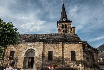 Fototapeta na wymiar 12th century church in the center of the picturesque Catalan village of Bossost, Spain,