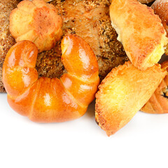 Assortment of bread, buns and croissant isolated on white background.