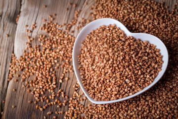Background of dried buckwheat with whole large kernel - Diet concept - Close up