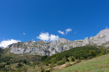 Fototapeta na wymiar View of the eastern massif of the Picos de Europa near Colio village in the Europa Peaks, Cantabrian Mountains, northern Spain.