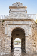 Fototapeta na wymiar Ancient stone sea Gate in old town Zadar in Croatia in afternoon