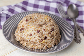 Traditional delicious Turkish food; rice pilaf with pine nuts and currants (Turkish name; ic pilav or pilaf)