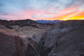 Colorful sunset over Zabriskie Point in Death Valley National Park, California