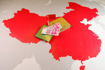 CPU and yuan bills over a Chinese map, concept of China digital Renminbi project, online payment, currency security and encryption