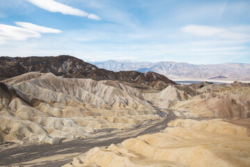 Fototapeta na wymiar Colorful hills and patterns at Zabriskie Point in Death Valley, California