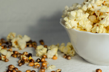 Popcorn in a white bowl. Close up.