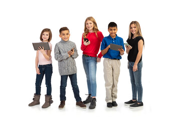 Obraz premium Kids: Modern Youth Using Digital Tablets And Cell Phones