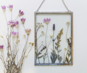 Framed pressed flowers in tiffany technique in stained glass