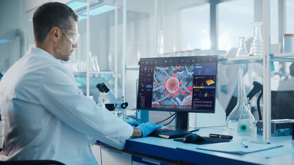 Fototapeta na wymiar Advanced Medical Science Laboratory: Medical Scientist Working on Personal Computer with Screen Showing Virus Analysis Software User Interface. Scientists Developing Vaccine, Drugs and Antibiotics.