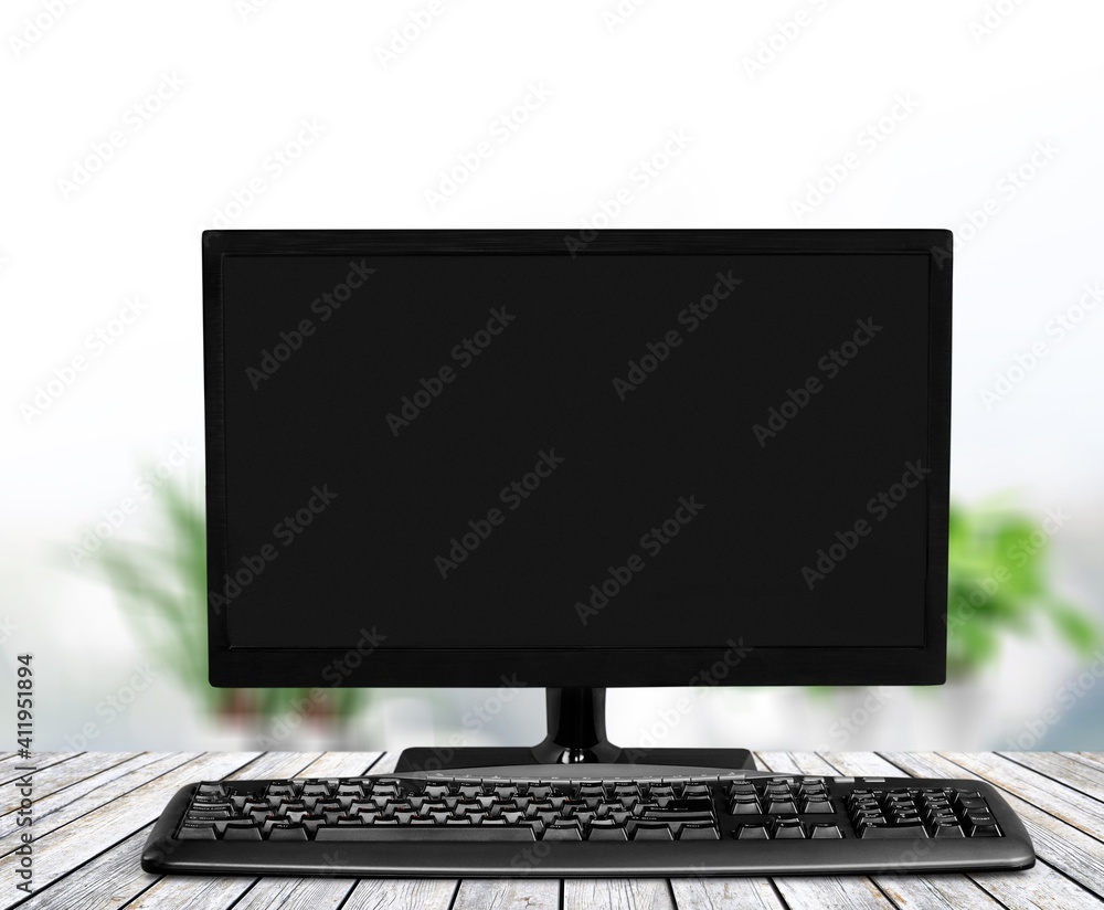 Poster modern desktop computer and keyboard on desk