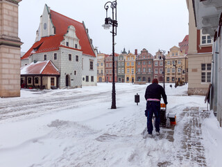 Poznan. Market square in snowfall.