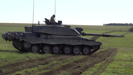 Action shot of a British army Challenger 2 FV4034 Main Battle Tank on a military exercise,...