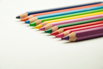 colored pencils on a white background. education concept. illustration of training.