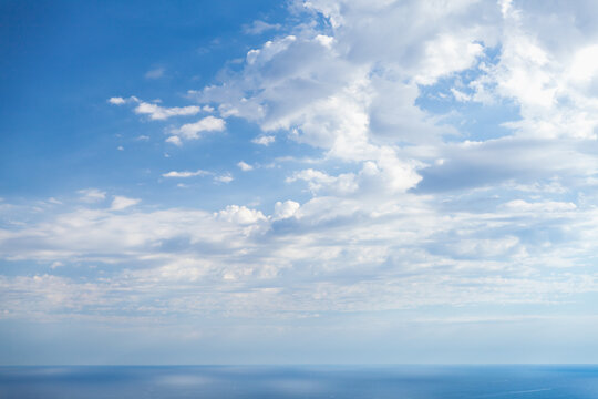 Empty coastal landscape blue sea under cloudy sky