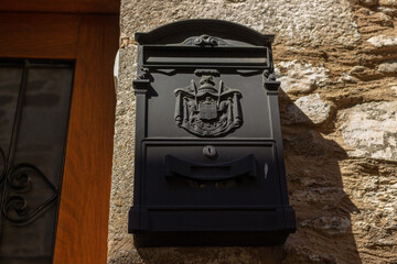 Puebla de Sanabria, Spain - September 6, 2020: Detail of an ancient mailbox in Puebla de Sanabria.