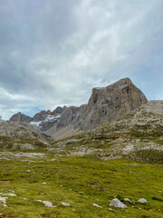 The upper start section of hiking track PR-PNP 24 to the magnificient summits of Mounts Pena Remona, Torre de Salinas, La Padierna and Pico de San Carlos at Picos de Europa National Park, Spain.