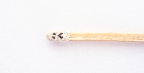 matchstick with faces painted on the heads