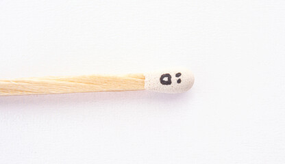 matchstick with faces painted on the heads